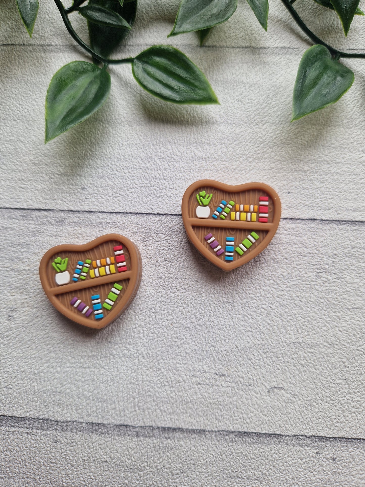 Bookshelf Needle Stoppers